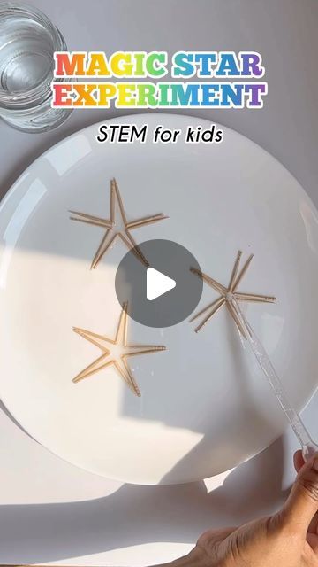 Ankita Bag on Instagram: "Toothpick Star Experiment For Kids ⭐️  What we need for this? 👉 5 wooden toothpicks 👉 Water 👉 A dropper 👉 Medium size plate   Step by steps:  Bend the 5 toothpicks in the middle but do not break them completely.  Put the 5 broken toothpicks in a circle with the broken points touching one another.  Carefully put a few drops of water in the middle using a dropper or a straw.  Now wait and watch how the toothpicks glide into place to form a star!  Science behind this:  When dry wood absorbs water, the bent wood fibres expand and unbend. As the toothpicks straighten out, they push against one another opening up the inside of the star  🔊If you like to watch more such STEM activities do follow @reeyansh_ad  LIKE | SHARE | FOLLOW   #playathome  #braindevelopment #ea Star Experiment, Toothpick Star, Experiment For Kids, Star Science, Wait And Watch, Drops Of Water, Stem For Kids, Bent Wood, Wood Fiber