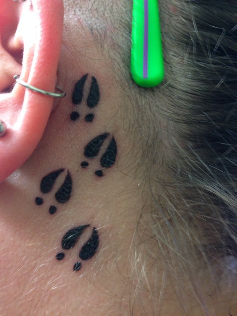 Hearing is the main sense you use when hunting so the deer tracks are behind my ear. Antler Behind Ear Tattoo, Deer Hoof Tattoo, Deer Track Tattoo For Women, Deer Tracks Tattoo, Deer Print Tattoo, Deer Antler Tattoos Men, Dog Hunting Tattoo, Ear Tag Tattoo, Small Hunting Tattoos