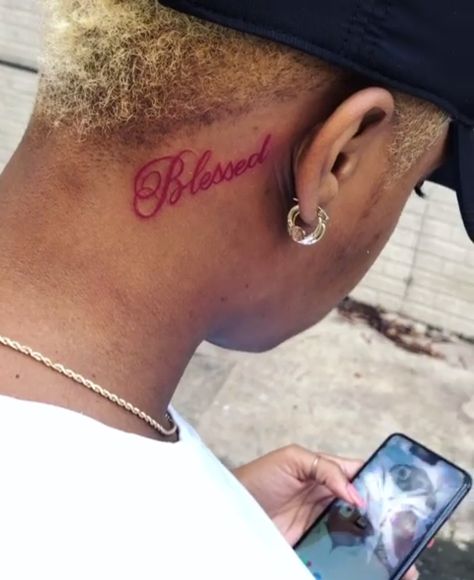 pin : @acquaintcd Red Blessed Tattoo, Name Behind Ear Tattoo Men, Blessed Tattoo On Neck, Crown Behind Ear Tattoo, Red Face Tattoo, Tattoos On Back Of Neck, Name Tattoos On Back, Tattoo On Back Of Neck, Small Name Tattoos