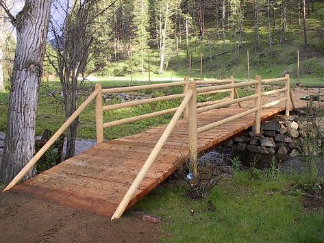 CAUTION Before Building Bridge's on a Small Stream on Your Property Creek Bridges Ideas, Diy Bridge Over Creek How To Build, Rustic Bridge Over Creek, Creek Bank Landscaping, Diy Creek Bridge, Small Bridge Design, Diy Bridge Over Creek, Wooden Bridge Over Creek, Diy Bridge