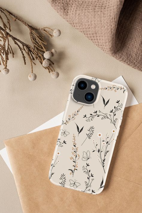 Phone case available for multiple iPhone models, in snap, soft and though cases. Iphone models available: 4s, 5s, 5c, 6, 6s, 7, 8, XR, X, XS, 11, 12, 13, 14. Aesthetic phone case, with a one line art flower pattern in neutral color. Beautiful vintage flower pattern that fits a boho aesthetic. Boho line art design in beige and burnt orange. Cute wild flowers pattern design. Iphone 13 Cases Aesthetic, Noelle Core, Aesthetic Phone Case Ideas, Beige Phone Case, Phone Case Inspo, Phone Case Painting, March Aesthetic, Flowers Pattern Design, Boho Phone Case