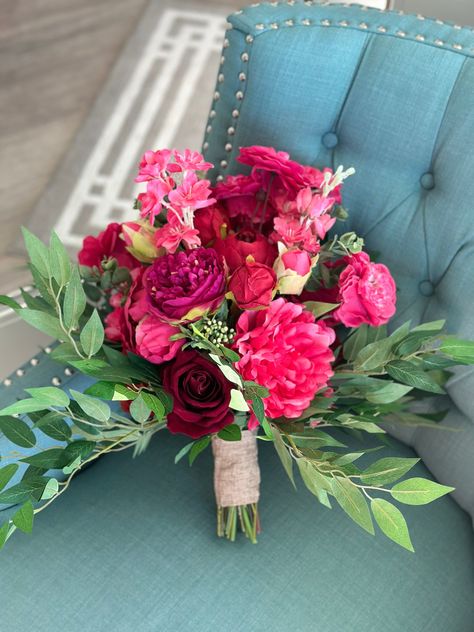 Stunning Wedding bouquet in fuchsia, hot pink, purple, red, and magenta. This bouquet is made with high quality silk flowers consisting of dahlias, roses, hydrangeas, and Italian Ruscus leaves. It has all the elegance, beauty and romance you could want and will complement and wedding dress! Each floral arrangement is handmade with great attention to detail and fine craftsmanship. Bouquets are finished with ribbon color of your choice. You can be sure to love the product you receive and it will l Fall Pink Floral Arrangements, Hot Pink Wedding Flowers Centerpieces, White Roses Flower Bouquet, Hot Pink Hoco Bouquet, Pink Red Bridal Bouquet, Hot Pink Beach Wedding, Red Pink Wedding Flowers, Homecoming Bouquet Ideas Pink, Red Pink Wedding Theme