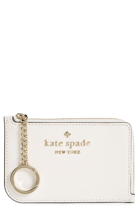 With just enough space for card and coin, this slender zip case is an everyday essential for traveling light. 3.25" x 5" x 0.25" Zip around closure Leather Imported Kate Spade Keychain Wallet, Designer Keychain Wallet, Katespade Card Holder, Christmas Gifts For Boyfriend Country, Cute Wallet Keychain, Wallet With Keychain, Cute Car Stuff, Keychain With Wallet, Car Keychain Aesthetic