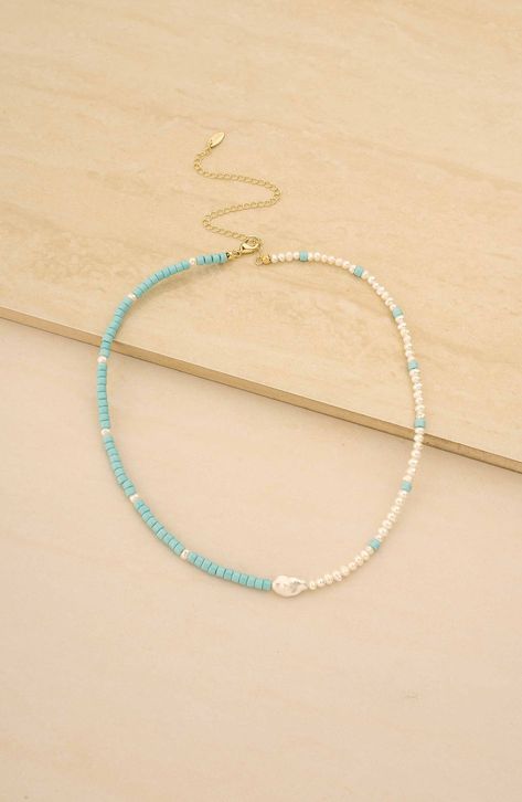 Turquoise-hued seed beads and organically shaped genuine pearls distinguish a gorgeous necklace that brings elegant boho style to any look. 16 1/2" length; 5" extender Pearl size: 5–5.5mm Glass seed bead/freshwater cultured pearl/18k-gold plate Imported Beach Beaded Necklace, Sead Bead Necklace, Bracelet Business, Pearl Bead Necklace, Bracelet Inspo, Beaded Necklace Patterns, Diy Collier, Beaded Jewelry Necklaces, Pearl Strand