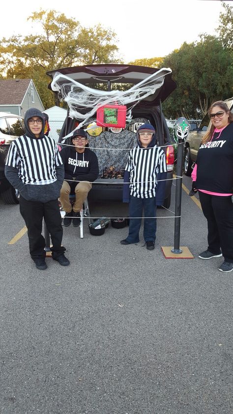 School trunk or treat WWE Ring Trunk Or Treat Wrestling Theme, Wrestling Trunk Or Treat, Wwe Trunk Or Treat Ideas, Wwe Trunk Or Treat, Trunk Or Treat A League Of Their Own, Track Or Treat Ideas, League Of Their Own Trunk Or Treat, Hockey Trunk Or Treat, Trunk Or Treat Bank Theme