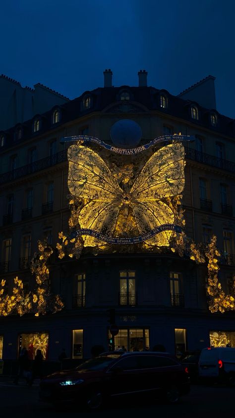 #dior #luxury #butterfly #light #montaigne #paris #night #yellow #gold #christmas Dior Astethic, Christmas In Paris Aesthetic, Paris Night Aesthetic, Dior Wallpapers, Dior Butterfly, Winter Butterfly, Dior Wallpaper, Dior Store, Dior Luxury