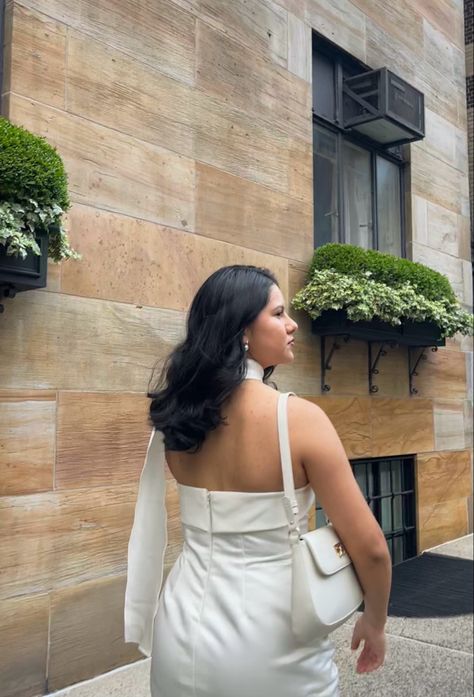 Wearing a strapless satin cream dress with matching scarf, pearl earrings, and shoulder bag Silk Halter Dress, The Upper East Side, White Strapless Dress, Elegant Aesthetic, Scarf Dress, Travel Pics, Upper East Side, White Silk, Cream Dress