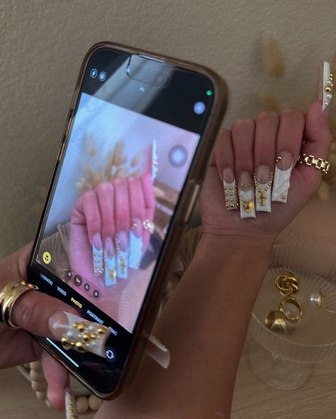 white + gold >>> ✨₊˚⊹♡⊹ ࣪ ˖ ♱ inspo @yokinailz 🫶🏼 — #nailinspo #kawaiinails #nailsofinstagram #explore #757nailtech #dmvnails #virginiabeachnailtech #baddienails #acrylicnails #birthdaynails #757nails #virginiabeachnails #trendynails #explorepage #editorialnails tags - Virginia Beach nail tech 757 nail tech nail inspo explore page editorial nails French tip nails while nails gold nails Nail Tech Doing Nails, Nail Day Outfit, Christian Dior Nails, Nail Flyers Ideas, Vision Board Nail Tech, Nail Tech Lifestyle, Nail Tech Profile Picture, Aesthetic Nail Pics, Nail Mood Board