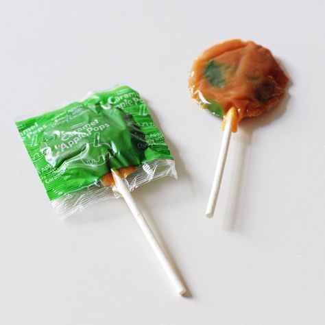 Pin for Later: The Best Halloween Candy Ranked From Worst to Best Tootsie Caramel Apple Pops The ultra sticky caramel coating gets stuck to the roof of your mouth, but that's a price we were willing to pay to enjoy this treat. Caramel Apple Lollipops, Apple Pops, Best Halloween Candy, Caramel Apple Pops, Oreo Cookie Pops, Apple Pop, Chocolate Covered Peanuts, Cookie Cake Birthday, Apple Cookies