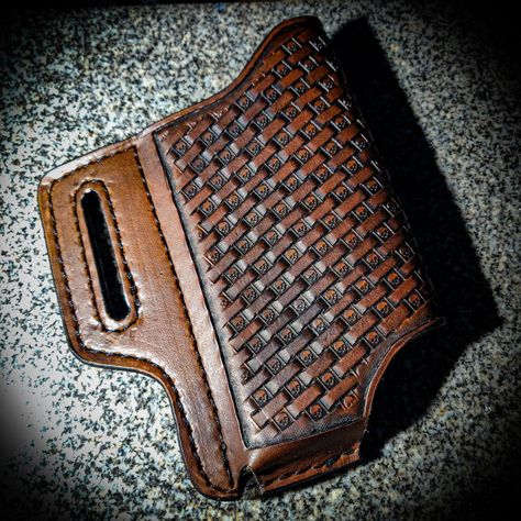 Dark brown leather cell phone case with a skull basket weave pattern going diagonal indirection. Perfect for wearing your phone on your hip. Leather Phone Holster Pattern, Leather Cell Phone Case Pattern, Leather Cell Phone Holster, Leather Phone Holster, Skull Basket, Pancake Holster, Leather Cell Phone Cases, Guitar Straps, Tablet Cases