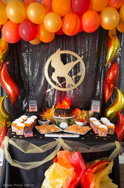 Our Epic Hunger Games Party Theme for Our Teens' Birthdays - Press Print Party Hunger Games Themed Birthday Party, The Hunger Games Party Ideas, Hunger Games Watch Party, The Hunger Games Birthday Party, Hunger Games Homecoming Theme, Hunger Games Movie Night, Hunger Games Party Food, Hunger Games Themed Food, Hunger Games Themed Party