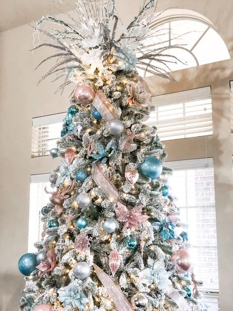 How to Decorate a Glam Christmas Tree - Her Life Sparkles Pink Blue And Silver Christmas Tree, Pink Blue Gold Silver Christmas Tree, Teal And Pink Christmas Decor, Teal And Pink Christmas Tree, Pink And Teal Christmas Tree, Glam Christmas Tree Ideas, Christmas Tree Roses, Teal Christmas Tree, Turquoise Christmas Tree