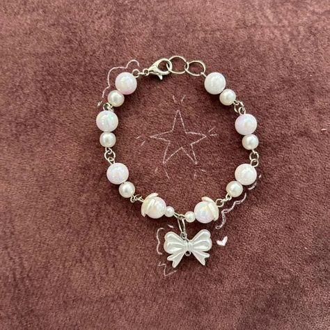 new beads drop - bow charm bracelet ♡ dm if interested ☆ + bracelets available Bow Charm, White Bracelet, Bow Bracelet, Aesthetic White, White Bracelets, White Bow, Handmade Jewelry, Charm Bracelet, Bracelet