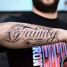 Top 250 Best Lettering Tattoos (October 2019) • Tattoodo Forearm Word Tattoo, Family Lettering, Lettering Tattoo Design, Forearm Name Tattoos, Family Name Tattoos, Family Tattoos For Men, Outer Forearm Tattoo, Names Tattoos For Men, Tattoo Lettering Styles