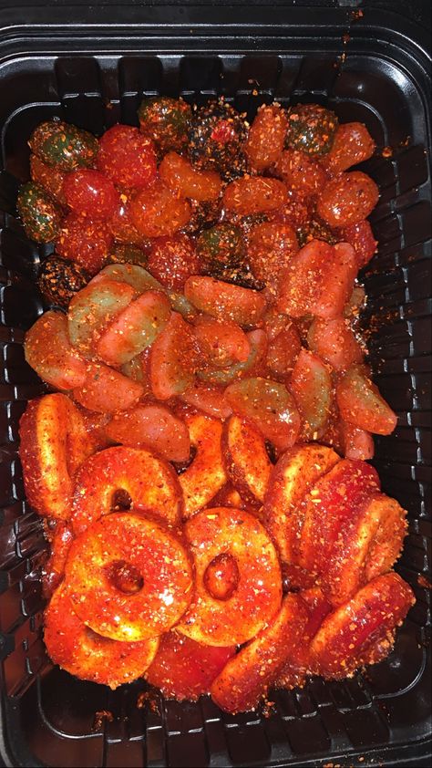 A customer order of Dulces Enchilados containing peach rings, gushers, and watermelon sour patch. Making Mexican Candy, Mexican Candy Aesthetic, Dulce Enchilado Candy, Dulces Enchilados Recipe, Spicy Foods Recipes, Enchilados Candy, Watermelon Sour Patch, Spicy Mexican Food, Spicy Mexican Candy