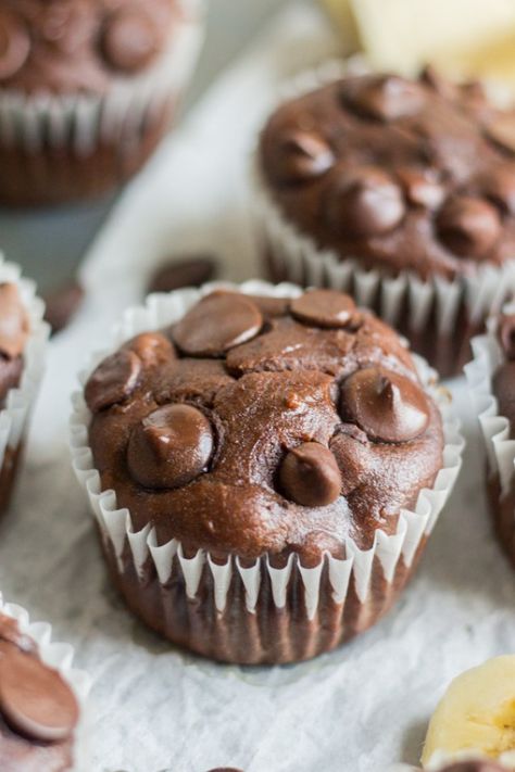 Healthy chocolate banana blender muffins! This muffin recipe is easy to make and gluten free. Mix the dry ingredients then blend all of the wet ingredients together. Fold in chocolate chips and bake until melted and gooey. They're also made with coconut oil and greek yogurt. They're the perfect magical chocolate muffin and so guilt free. Chocolate Banana Muffins Recipe, Beaming Baker, Healthy Chocolate Banana, Muffins Gluten Free, Blender Muffins, Banana Oat Muffins, Chocolate Banana Muffins, Healthy Chocolate Chip, Banana Chocolate Chip Muffins