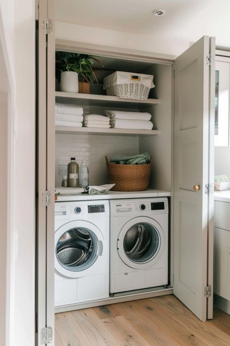 Laundry closet with washer, dryer, towels, and storage baskets. Utility Small Room Ideas, Utility Extension Ideas, Utility Room Cupboard Ideas, Walk Through Utility Room, Pretty Utility Room, Utility Room Office, Small Kitchen Utility Ideas, Small Laundry Ideas Space Saving, Utility Room In Garage