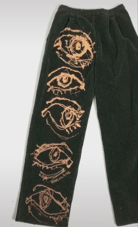 Pants With Eyes On Them, Bleach Paint Sweatpants, Pants With Bleach Design, Bleach Painting Black Jeans, Bleach Art Sweatpants, Bleach Dyed Pants, Bleached Black Shirt Ideas, Bleach Designs On Clothes, Black Pants Bleach Art