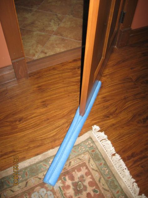 We like to leave the windows open in our bedroom during the cool months but don't want that cool air invading the rest of the house. This is the easiest door sweep, and it seals just fine. Buy one of... Uses For Pool Noodles, Draft Stopper Diy, Homemade Door, Pool Noodle Crafts, Door Sweep, Door Draught Stopper, Door Draft, Pool Noodle, Door Inspiration