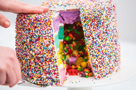 Sweet Candy-Filled Piñata Cake – Makeful Filled Cakes With Candy, Candy Filled Cake How To Make A, How To Make A Pinata Cake, Exploding Cake Ideas, Nerds Candy Cake, Candy Surprise Cake, Pinata Cake Ideas, Nerds Cake, Cake Filled With Candy