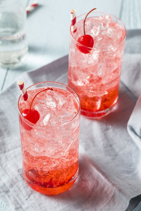 Shirley Temple Cocktail - Made with grenadine, ginger ale, ice, maraschino cherry or orange slice | CDKitchen.com Dirty Shirley Recipe, Shirley Temple Recipe, Shirley Temple Drink, Dirty Shirley, Cherry Drink, Cherry Vodka, Cherry Cocktail, Cocktail And Mocktail, Cherry Flavor