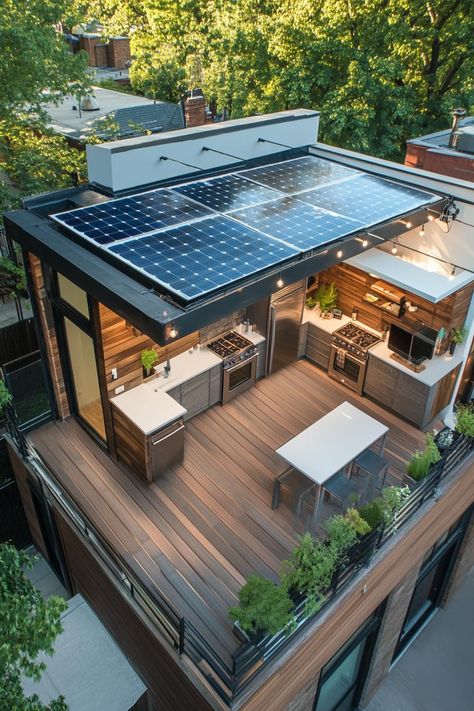 Modern house rooftop deck with a solar panel and outdoor kitchen. Check out all of these modern houses with roof decks that boost both style and functionality. Rooftop Design House, Rooftop Ideas House, Rooftop Terrace Design Roof Deck, Modern House With Roof Deck, House Rooftop Deck, Rooftop Deck Ideas, House With Rooftop, Solar Panels On Roof, Rooftop Kitchen