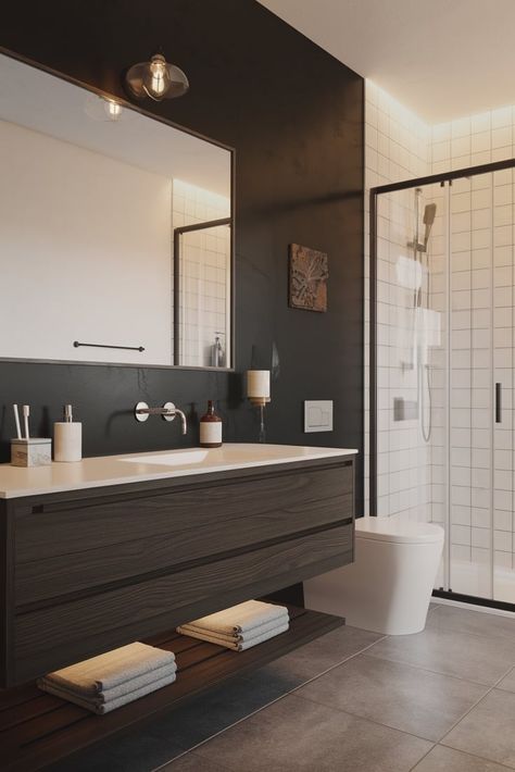 Less is more in this striking minimalist bathroom design featuring a dark wood floating vanity against a bold black accent wall. Pure contemporary elegance. #MinimalistDesign #FloatingVanity #ModernBathroom Dark Bathroom Wood Vanity, White And Dark Wood Bathroom, Dark Brown Bathroom Vanity, Bathroom Dark Wood, Dark Wood Vanity, Dark Brown Bathroom, Brown Bathroom Vanity, Black Accent Wall, Brown Bedroom Decor