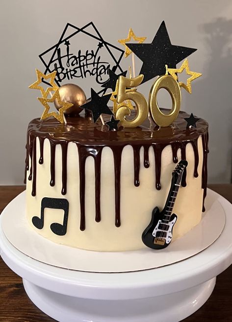 Guitar Cake Topper Set 1 guitar 1.3x3.5 inch 4 gold ball cake toppers(1.6, 1.2, 1.0, 0.7) inches 6 note cake toppers(2.5x1.6, 0.9x2.1, 2.0x1.5) inches 5 gold star cake toppers 1.5 inch 7 black star cake topper(3.5, 2.3, 1.5, 0.7) inches 1 black happy birthday cake topper 4.2x 6.1 inches Guitar is made of high quality wood. Happy Birthday cake topper is made of acrylic. Stars are made of cardstock. Balls are made of foam and latex wire. Guitar can be used as a keepsake as well. This cake topper s Music Bday Cake, Music Themed Cakes For Men, Black Happy Birthday Cake, Music Notes Cake, Musician Cake, Guitar Cake Topper, Music Cake Topper, Wire Guitar, Guitar Birthday Cakes