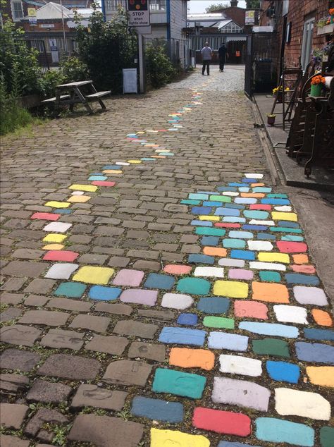 Painted cobbles #anniesloan#painteverything Painted Pathways, Painted Cobblestone, Pavement Art, Landscape Design Drawings, Stone Landscaping, Event Props, Road Design, Art District, Backyard Fire