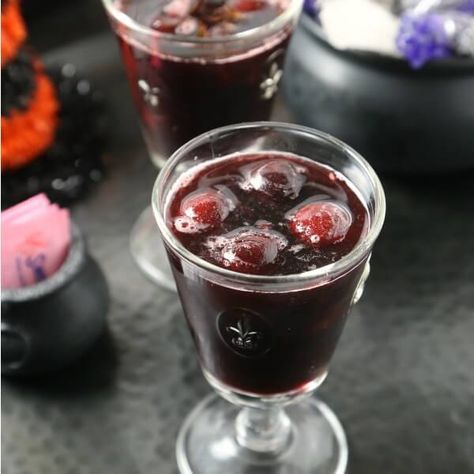 Toast Halloween With A Bewitching Blood Red Rum Punch Red Rum Punch, Halloween Punch Recipes, Halloween Treats To Make, Red Punch, Alcoholic Punch Recipes, Red Rum, Halloween Punch, Alcoholic Punch, Halloween Food Treats