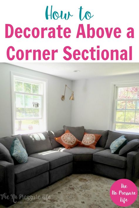 Decorating around corner sectionals can be tricky, so these tips on how to decorate above a corner sectional sofa in your living room are super helpful. Click here to get pretty ideas for wall decor above your couch, plus a free decorating ebook! #livingroom #decoratingtips #homedecor #decorating #decorideas Sectional Sofa In Corner, How To Decorate Behind A Sectional, Behind The Sectional Ideas, Gallery Wall Above Sectional, Corner Sectional Wall Decor, Sectional In Corner Of Living Room, How To Decorate Corners Living Room, Living Room Wall Above Couch, Corner Gallery Wall Living Room