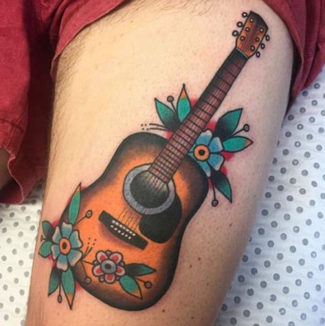 Best Guitar Tattoo Designs 1 Country Guitar Tattoo, Music Traditional Tattoo, Traditional Guitar Tattoo, Traditional Music Tattoo, Traditional Tattoo Music, Guitar Tattoo Ideas, Music Inspired Tattoos, Country Music Tattoos, Tattoo Guitar