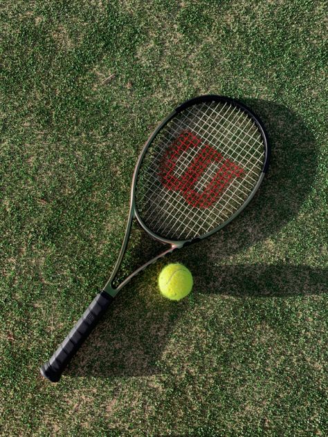 Wilson tennis racket on green tennis court Wilson Racket Tennis, Tennis Racket Aesthetic, Wilson Racket, Wilson Tennis Racket, Tennis Vibe, Racket Tennis, Kate Middleton Style Outfits, Tennis Camp, Yearbook Photo