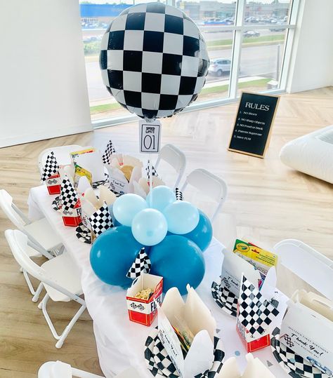 Millen is a Fast One 1st Birthday Race Car theme 🤍💙🖤 We had a blast with this “One” 😉 . . . . Event Decor (Balloons, Centerpieces:… | Instagram Diy Car Theme Birthday Decor, Race Car Party Centerpiece, Cars Centerpiece Ideas, 1st Birthday Race Car Theme, Race Car Centerpiece Ideas, Birthday Race Car Theme, Balloons Centerpieces, Car Centerpieces, Motorcycle Birthday Parties