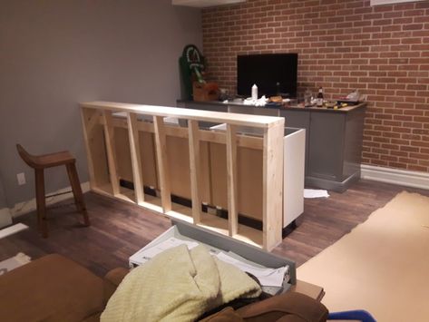 Transforming kitchen cabinets to a rustic bar 7 Basement Bar Wall Cabinets, Bar From Kitchen Cabinets, Bar Made From Ikea Cabinets, Basement Bar Stock Cabinets, Bar With Stock Cabinets, Bar Hacks Diy, Bar From Cabinets, Building A Bar With Cabinets, Diy Bar Using Kitchen Cabinets