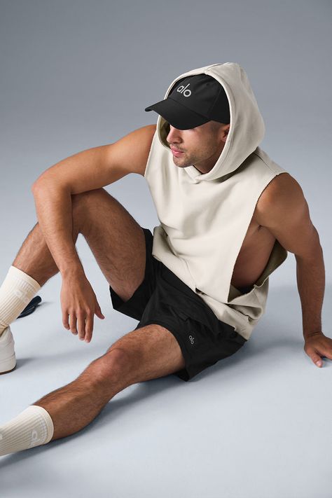 Stay cozy without sacrificing style in the Renown Sleeveless Hoodie. It has deep armholes, a kangaroo pocket, and a laid-back cut. And wait till you feel the Alo signature Renown fabric—it's smooth on the outside, a little fleecy on the side, and heavyweight for a just-right drape. Add shorts and you’re covered from the gym to the street. Sporty Look Men, Best Gym Outfits Men, Men Activewear Fashion, Alo Mens, Hooded Activewear With Kangaroo Pocket For Streetwear, Alo Yoga Sporty Hoodie For Streetwear, Men Yoga Outfit, Men Workout Outfits, Man Gym Outfit