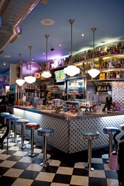 https://flic.kr/p/6qKPgH | Big Daddy's Diner - Counter | A throwback to the diners of the 1950s, Big Daddy's, located on the Upper East Side, serves all-American staples that draw families and late-night revelers alike. Diner Counter, American Diners, Schoolhouse Lights, Diner Aesthetic, 1950s Diner, 50's Diner, Lights Room, 50s Diner, Diner Decor