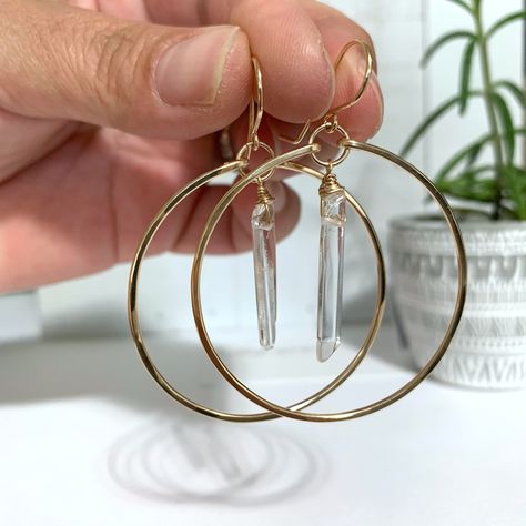 14k gold filled or 925 sterling silver raw crystal quartz boho hoop earrings. Hammered for texture and shine, the hammering process leaves tiny facets on the bars that catch light and sparkle as you wear it. HANDMADE item not manufactured so every piece has it's own uniqueness Made when ordered. Raw or Polished natural quartz points, depending on what I have in my inventory. Attention: Every stone will vary in size and shape for every order because every stone has its own uniqueness. No crystal Quartz Hoop Earrings, Quartz Crystal Jewelry, Ammolite Jewelry, Boho Hoop Earrings, Handmade Crystal Jewelry, Raw Quartz Crystal, Crystal Hoop Earrings, Diy Crystals, Quartz Jewelry