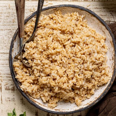 How to Cook Fluffy Brown Rice How To Cook Long Grain Brown Rice, Brown Rice Cooking Instructions, Brown Rice Stovetop, How To Cook Brown Rice On The Stove, How To Make Brown Rice, Brown Rice In Microwave, How To Cook Brown Rice, Fluffy Brown Rice, Cooking Brown Rice