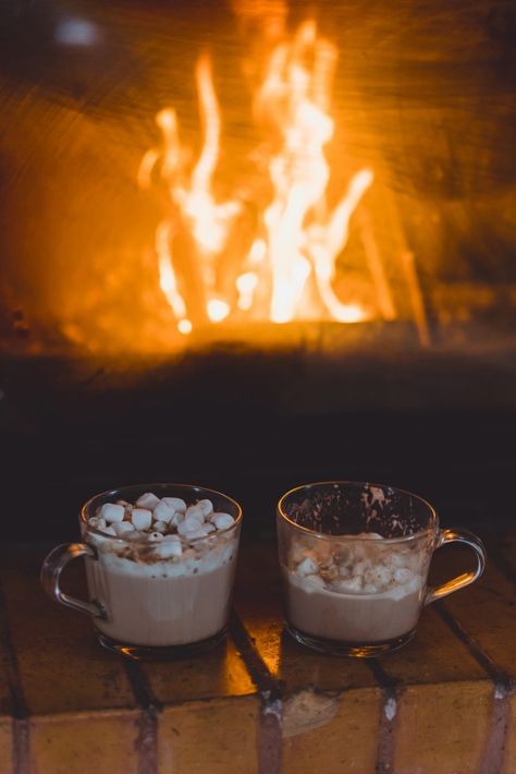 Cocoa mugs with marshmallows near the fireplace. Download it at freepik.com! #Freepik #freephoto #christmas #winter #coffee #new-year Hot Cocoa Fireplace Aesthetic, Hot Chocolate By The Fireplace, Christmas Coffee Aesthetic, Hot Cocoa Aesthetic, Hot Chocolate Pictures, Coffee In Winter, Hot Chocolate Aesthetic, Fireplace Aesthetic, Winter Cafe