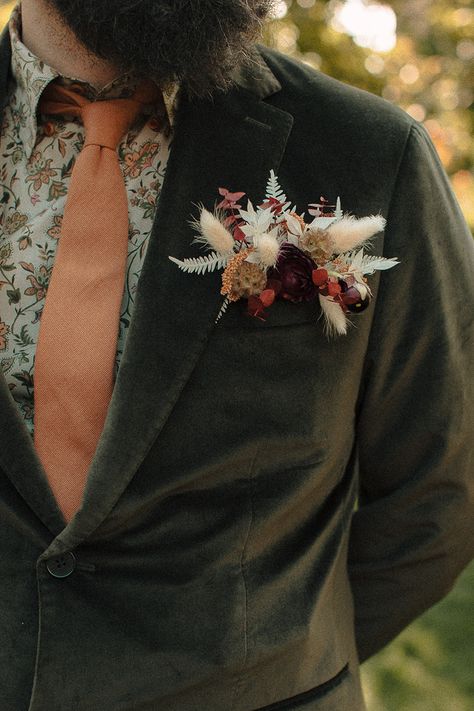 Rustic Wedding Tuxedo, Mens Unique Wedding Attire, Unique Men’s Wedding Outfit, Mens Floral Wedding Attire, Alternative Wedding Suits Men, Cottagecore Groomsmen, Cottage Core Groom Suit, Dark And Moody Groom Attire, Cottagecore Wedding Suits Men