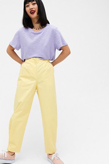 Tapered trousers - Pale yellow - Trousers & shorts - Monki NL Yellow Trousers Outfit, Yellow Top Outfit, Yellow Pants Outfit, Royal Blue Outfits, Women Trousers Design, Yellow Jeans, Trouser Outfit, Orange Outfit, Yellow Pants