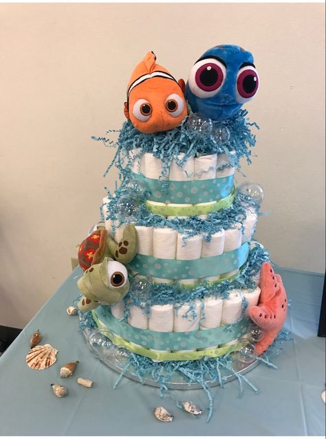 Finding Nemo diaper cake Finding Nemo Gender Reveal, Nemo Baby Shower Ideas, Finding Nemo Baby Shower Ideas, Finding Nemo Theme, Nemo Baby Shower, Finding Nemo Baby, Ash Baby, Nemo Baby, Finding Nemo Party