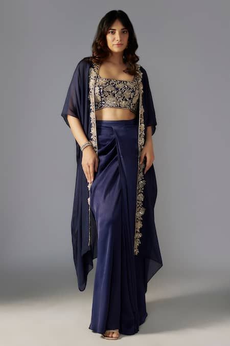 Buy Blue Blouse And Skirt Crepe Satin Embellished Bead Blossom Sequin Draped Set For Women by MAISOLOS Online at Aza Fashions. Saree Cape Blouse, Simple Indo Western Outfits, Drape Skirt Indian, Wrap Blouse Outfit, Lehenga Designs Simple, India Dress, Indian Dresses Traditional, Backless Blouse, Indian Gowns Dresses