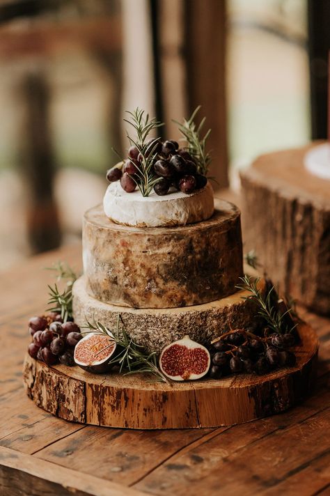 Cheese tower decorated with figs and other fruit for wedding Cheese Wheel Wedding Cake, Cheese Tower Wedding Cake, Wedding Cake Earthy, Food Serving Ideas, Deep Red Bridesmaid Dresses, Wedding With Sunflowers, Duck Wedding, Wedding Cheese, Cheese Tower