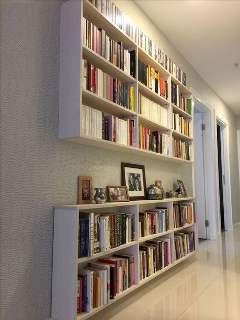 Narrow Hallway Bookshelves, Shallow Book Shelves, Narrow Hallway Bookshelf, Hall Bookshelf Ideas, Hallway Library Narrow, Book Shelves In Hallway, Full Wall Bookshelf Bedroom, Shallow Bookshelf Wall, Wall Length Bookshelves