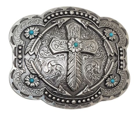 Add a touch of Western charm to your wardrobe with the Feather Cross Belt Buckle. Featuring a beautiful combination of Feathers, Arrows, and 5 Turquoise stones placed just right, this antique silver buckle measures 3 tall by 4 wide and is perfect for Cowboy Church. Whether you visit our retail store in Smyrna, TN or shop online, don't miss the chance to add this unique piece to your collection. Cute Belt Buckles Women, Cross Belt Buckle, Belt Buckles Cowgirl, Ffa Emblem, Cowgirl Belt Buckles, Cross Belt, Custom Belt Buckles, Western Fits, Cowboy Belt Buckles