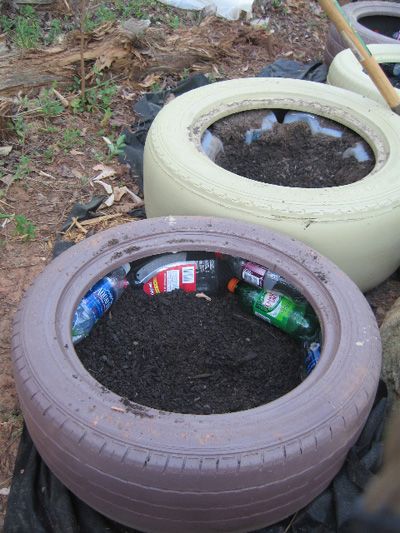 Diy Tire Garden Ideas, Tractor Tire Vegetable Garden, Using Tires For Planters, Tire Vegetable Garden Ideas, Tractor Tire Garden Raised Beds, Tire Raised Garden Bed, Landscaping With Tires, Tire Fire Pit, Tire Flower Planters