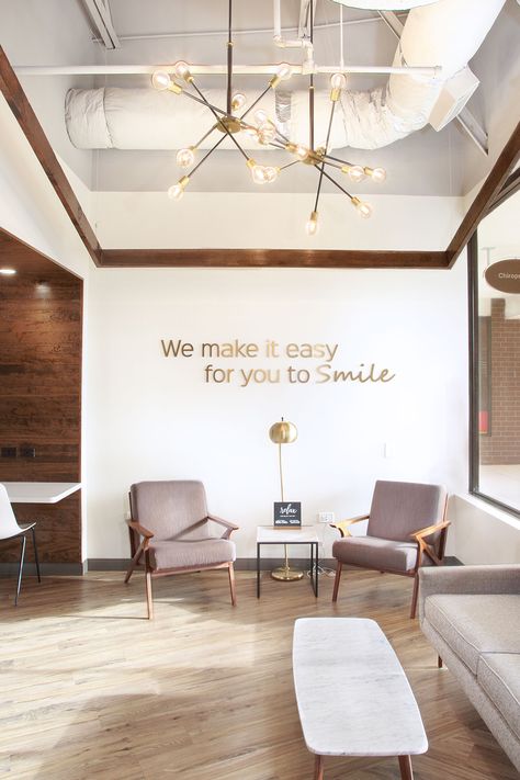 Dental Office Decor Ideas Accent Walls, Dental Clinic Interior Reception, Medical Clinic Interior Design Waiting Area, Office Decor Commercial, Cute Waiting Room Ideas, Selfie Wall Dental Office, Doctors Office Reception Area, Welcoming Waiting Room, Reception Decorations Office