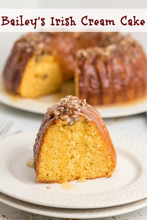 This easy to make Bailey's Irish Cream Cake is tender and uniquely flavorful. The Irish cream liqueur in the batter and the glaze is a double whammy of deliciousness. Irish Cream Cake Baileys, Irish Creme Cake, Bailey’s Irish Cream Cake, Desserts Made With Bailey's Irish Cream, Baileys Irish Cream Cake Recipe, Baileys Irish Cream Bundt Cake, Baileys Cake Recipes, Irish Cream Cake Recipe, Irish Deserts Easy